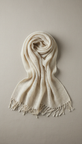 Woven cream linen throw with fringed ends