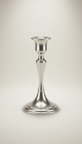 Polished metal candle holder in tapered form